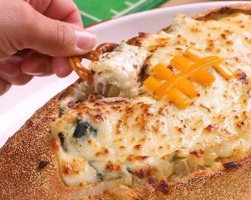 Ultimate Game Day Spinach Artichoke Dip Bread Bowl suggested serving